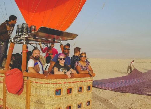 Certified balloon crew preparing for early morning flight in Luxor