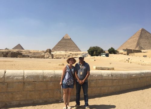 Tourist and tour guide phot at the pyramids